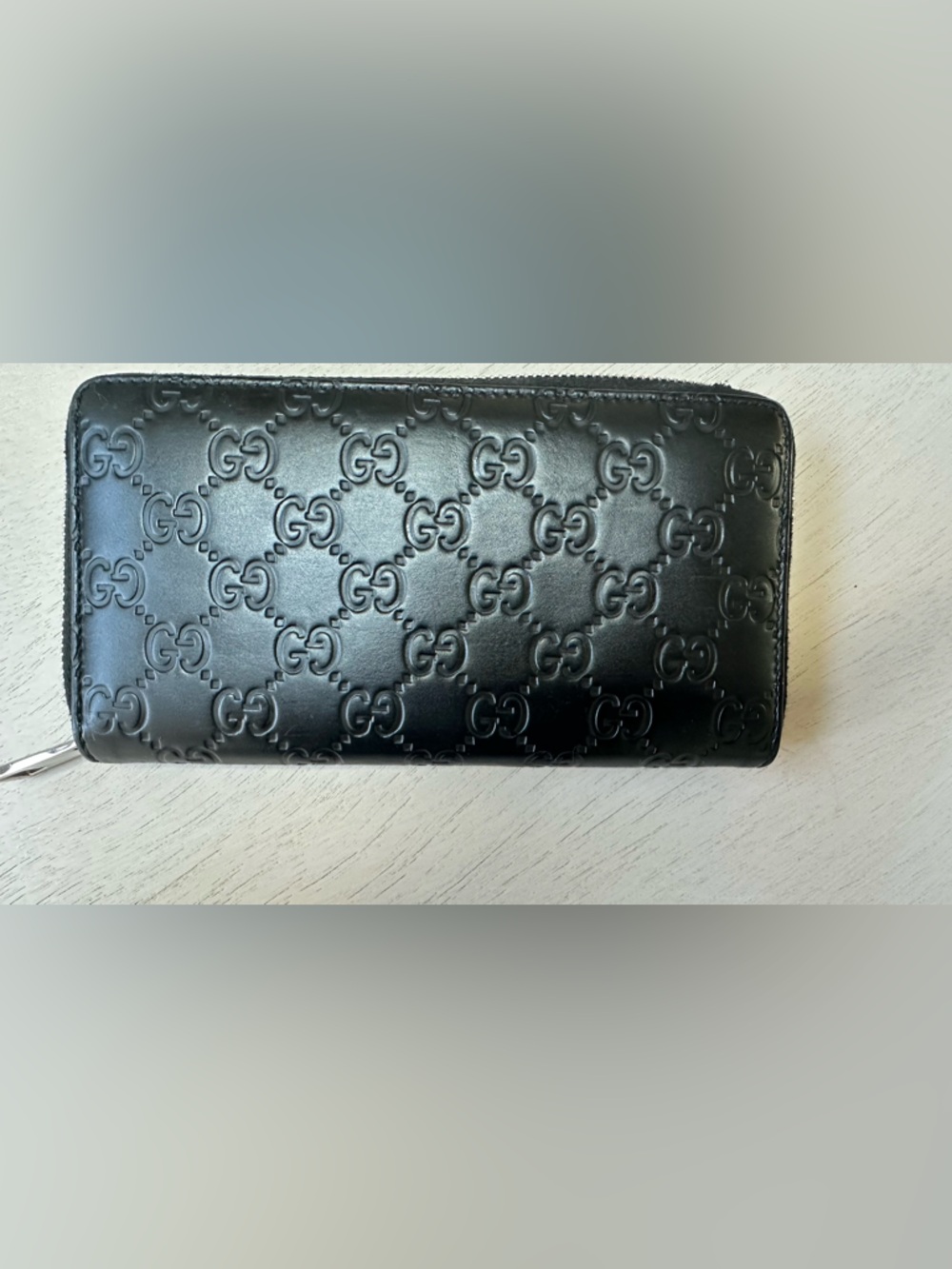 Authentic Gucci GG embossed zip-around wallet in black leather. Made in Italy. - Picture 2 of 14